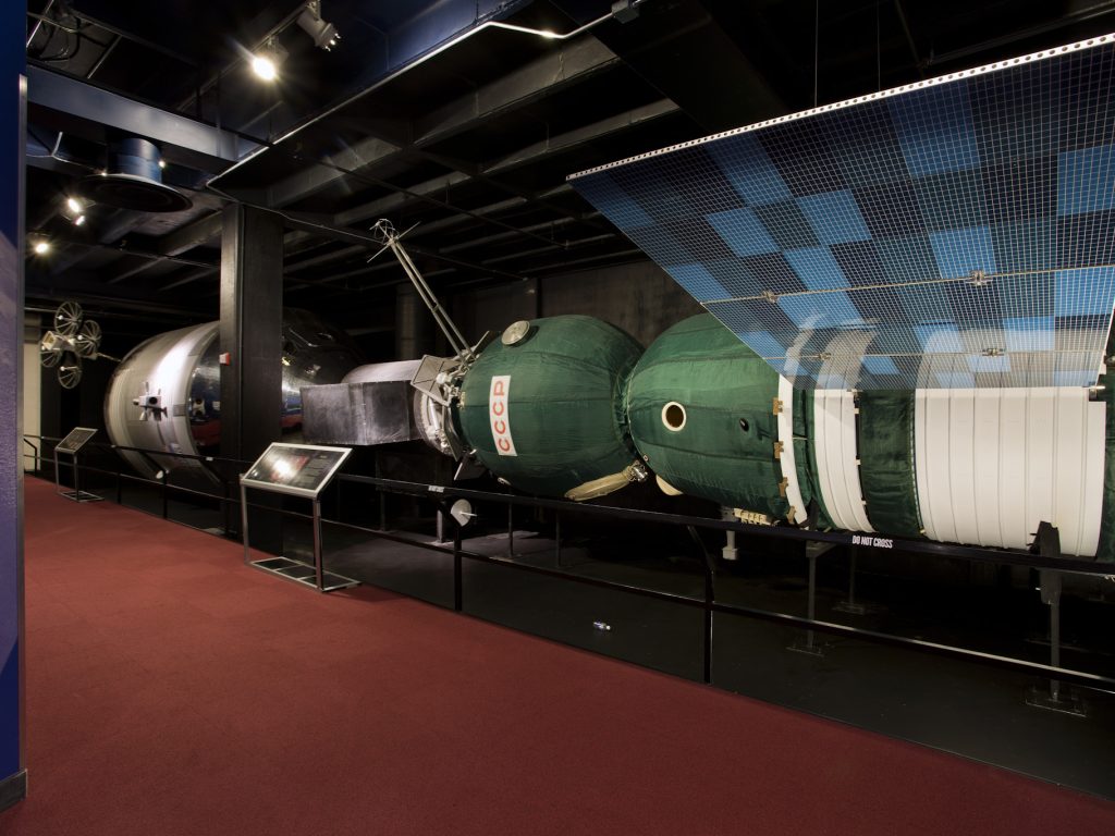 This exhibit illustrates the docking of the Americans and Soviets in the first joint manned mission in space.