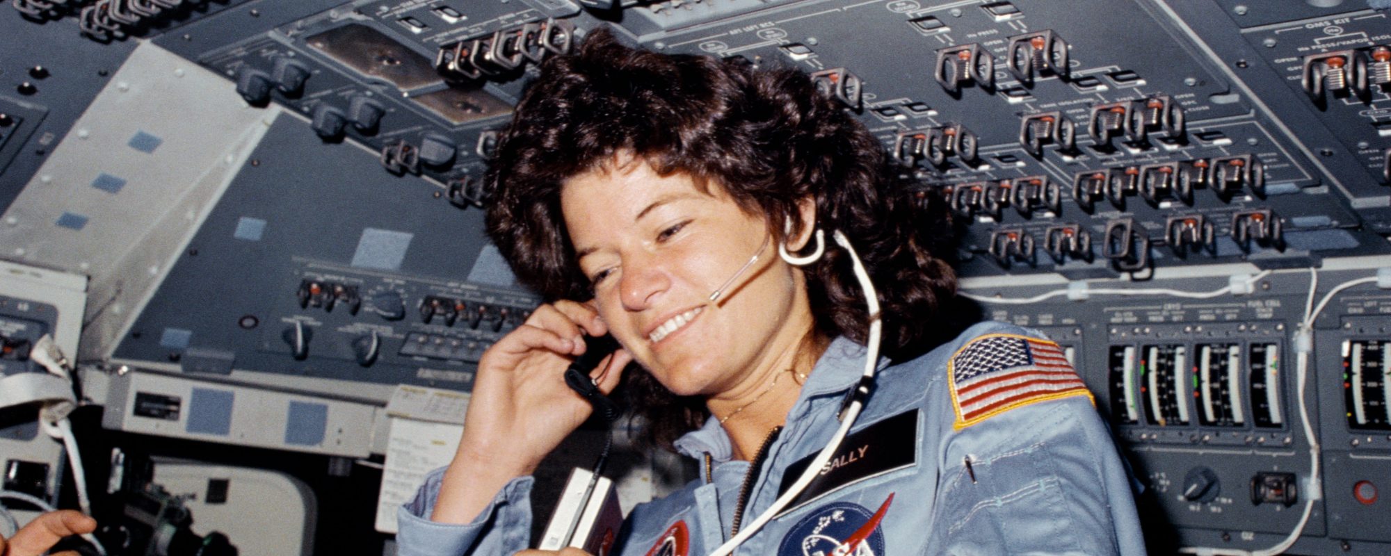 S83-35763 / STS007-02-027 (18 June 1983) --- Seen on the flight deck of the space shuttle Challenger, astronaut Sally K. Ride, STS-7 mission specialist,  became the first American woman in space on June 18, 1983.  Photo credit: NASA
